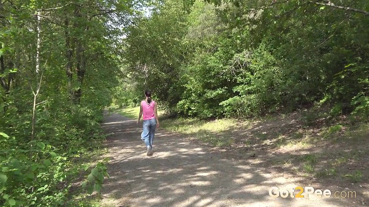 Ali Bordeaux pees near cut down logs