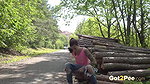 Ali Bordeaux pees near cut down logs