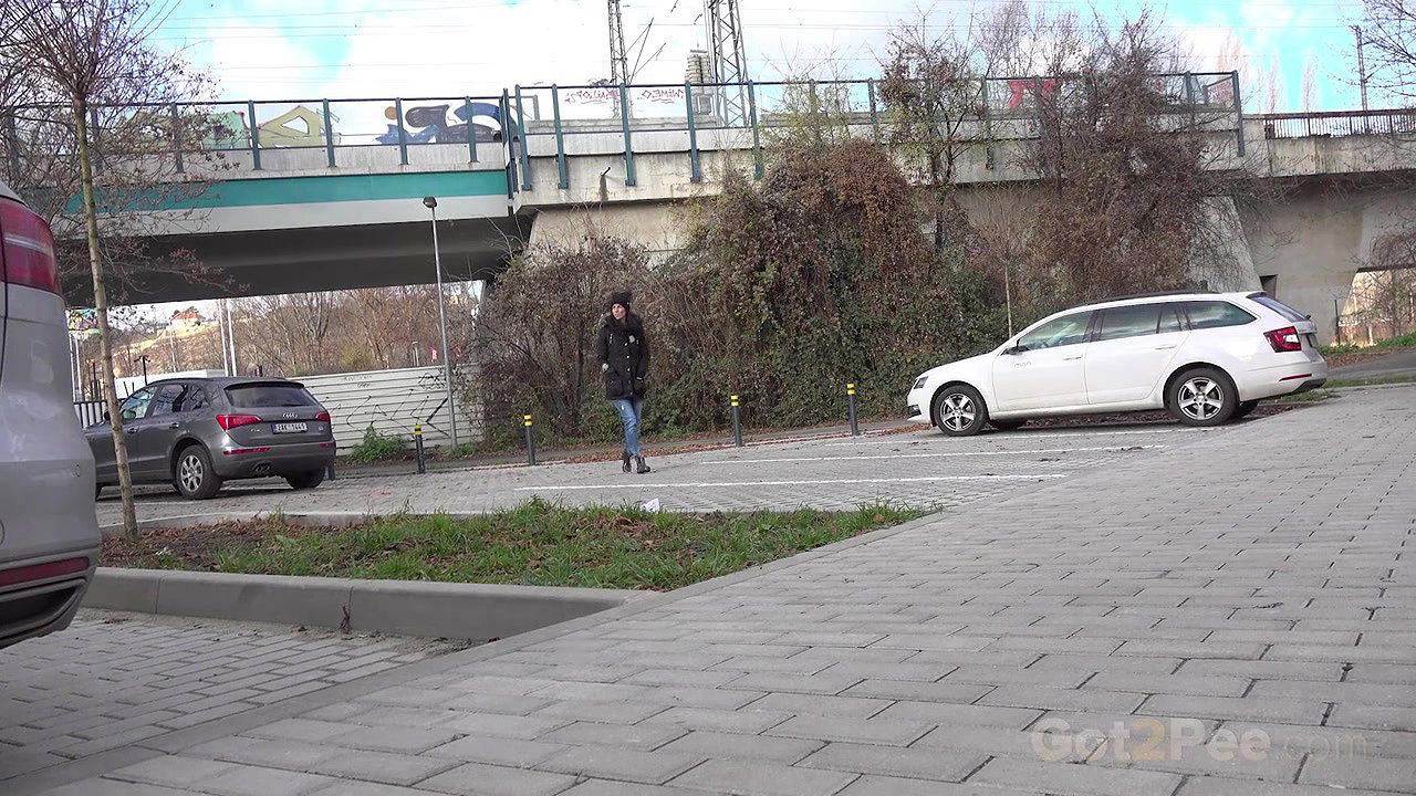 Ali Bordeaux squats and pees in a car park