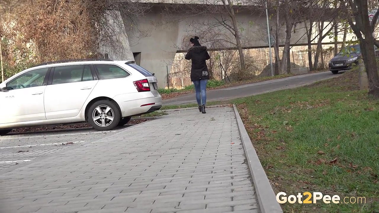 Ali Bordeaux squats and pees in a car park