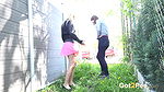 Blonde and brunette piss by the side of a building