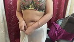 Chubby woman removing saree