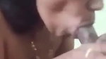 Tamil aunty sucking a cock
