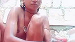 Slim village bhabhi bathing outdoor video making
