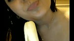 naughty indian babe sucking a banana on camera
