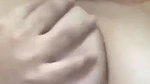 Cutie playing with her boobs