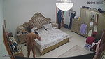 couple in bedroom with wife walking nude in