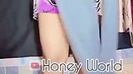 wearing violet top and jeggings