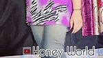 wearing violet top and jeggings