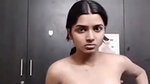 Young Beautiful Indian Girl Changing Clothes