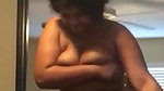Horny chubby girlfriend with huge tits seducing her boyfriend by nude dancing in front of him