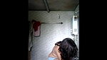 girl getting undress in bathroom