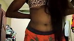 dusky indian girl pressing own boobs