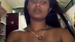 dusky indian girl pressing own boobs