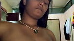 dusky indian girl pressing own boobs