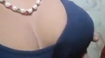 teen girl pressing own boob