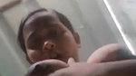 teen girl pressing own boob