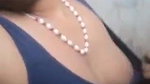 teen girl pressing own boob
