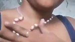 teen girl pressing own boob