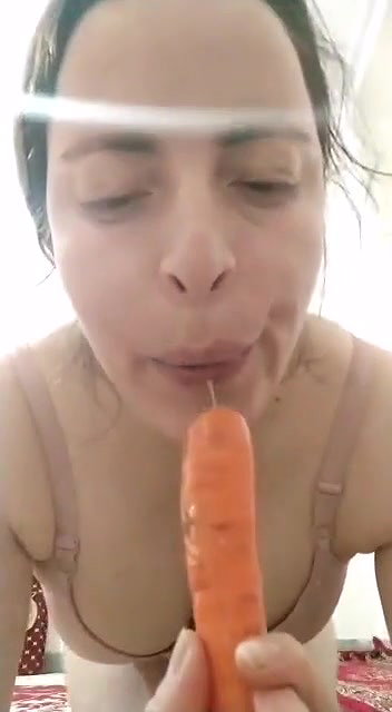 Horny beautiful Cheating paki wife seductive moves with carrot to seduce her young boyfriend