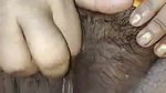 Bengali Boudi fingering her hairy pussy