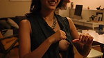 hot girl oiling own boob