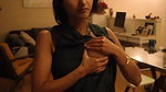 hot girl oiling own boob