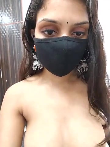 Sexy nude girl applying chocolate on body