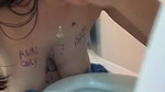 beautiful girl boobs paint drink toilet water