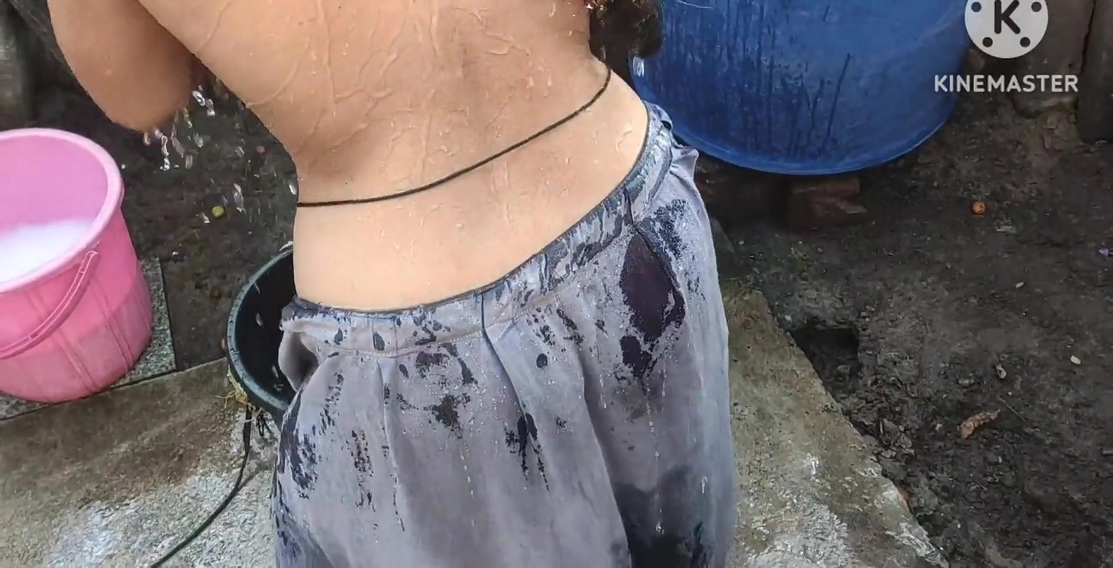 Indian bathing outside with hot boobs