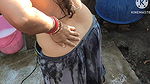 Indian bathing outside with hot boobs