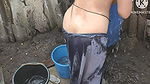 Indian bathing outside with hot boobs