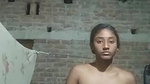 cute village girl apply oil to her body