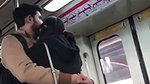 Couple kissing in delhi metro