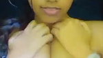 Cute girl playing with her tits