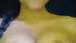 Cute girl playing with her tits
