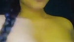 Cute girl playing with her tits