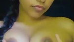 Cute girl playing with her tits