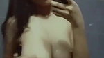 young girl showing big boobs in mirror