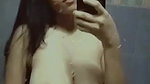 young girl showing big boobs in mirror