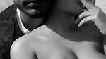 girlfriend smoking cigarette with boob press