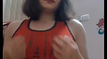 short haired girl playing with her big boobs