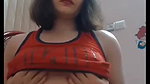 short haired girl playing with her big boobs