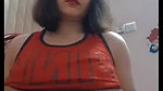 short haired girl playing with her big boobs