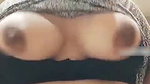 topless unmarried girl spitting on her big boobs