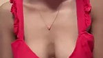 Horny babe playing with her boobs