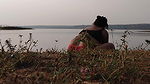 Hot desi sexy girl having fun here with village boyfriend taking bath on river.    .