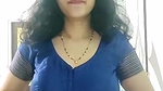 busty MILF removing blouse and showing big boobs