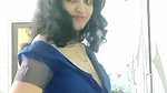 busty MILF removing blouse and showing big boobs