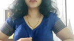 busty MILF removing blouse and showing big boobs